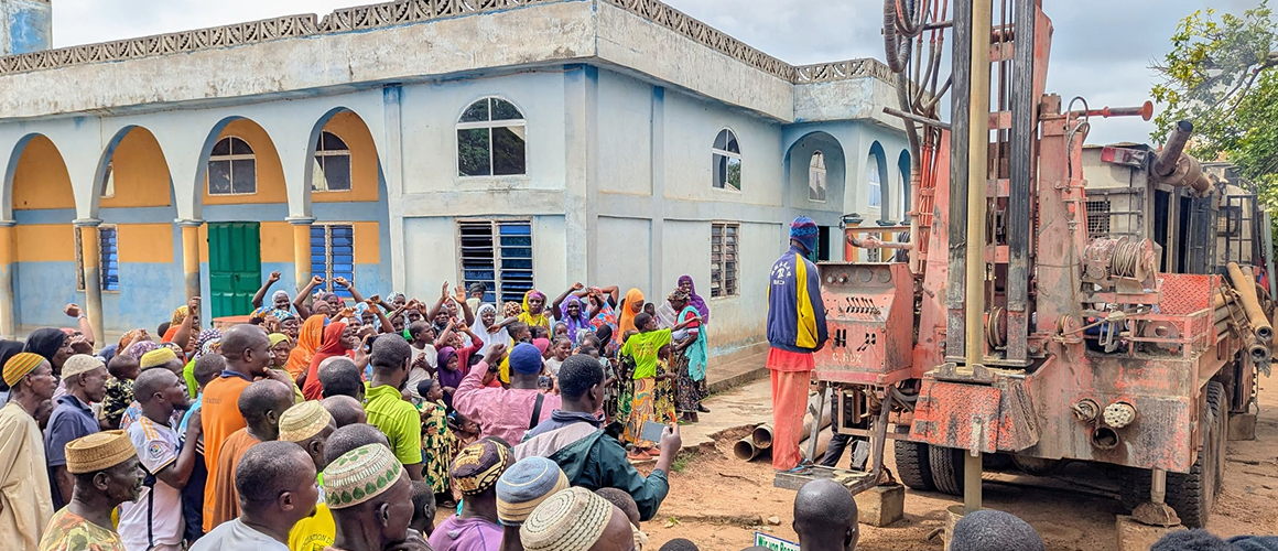 Borehole drilling operation in rural community