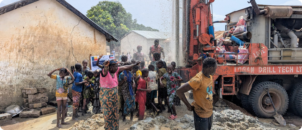Volunteers around a well